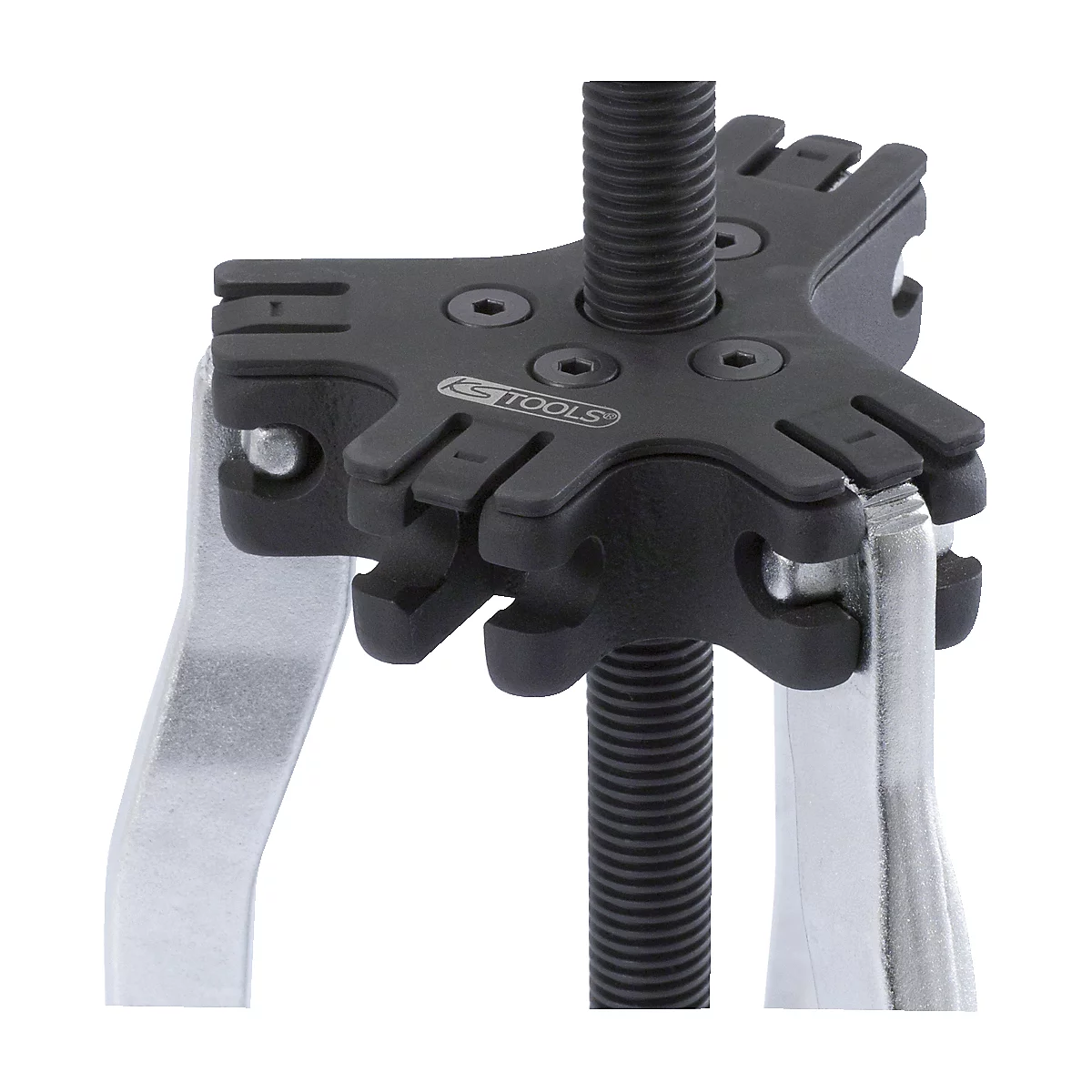 Ein schwarzer KFZ-Abzieher, zentral eine Gewindestange, darauf ein schwarzer, sternförmiger Halter mit Krallen und silbernen Hebeln.